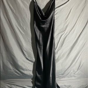 long black silk dress with lace a back, and a side cut down the side for the leg